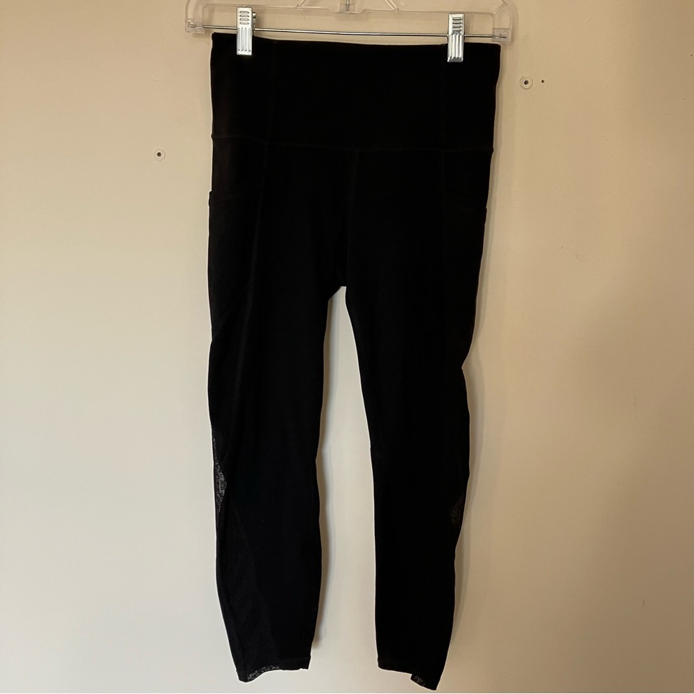Athleta Black Capri Leggings with Polka Dot Mesh Accent on Calf size Small